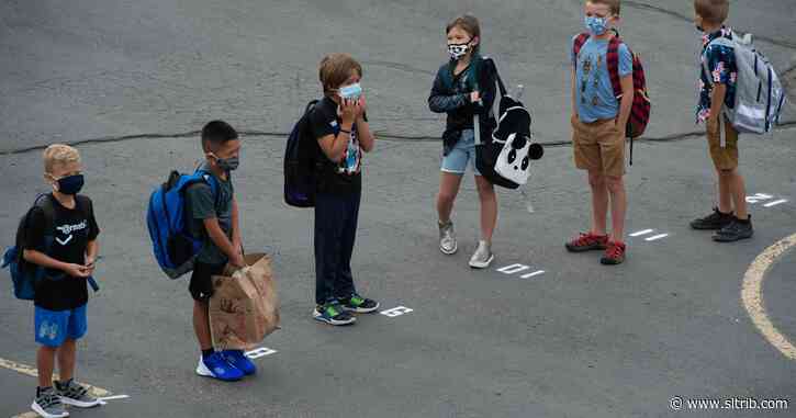 Utah students start school with masks and a squirt of hand sanitizer