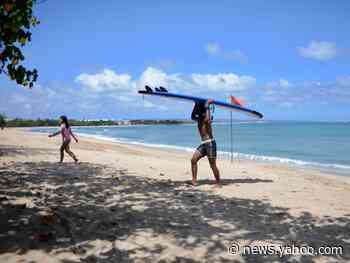Bali won't allow international visitors until at least 2021 as the island sees a spike in coronavirus cases