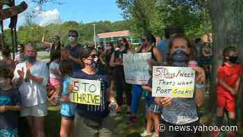 Switching from in-person to hybrid learning prompts rally on Long Island