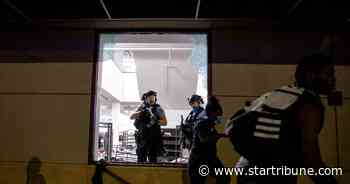 Curfew expires, daylight exposes rioting's scars in downtown Minneapolis