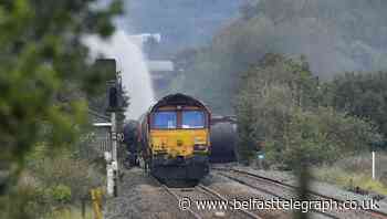 Fire on derailed diesel freight train ‘could burn for days’