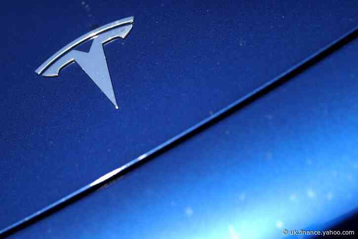 Tesla shares surge to record high, leaving rivals behind