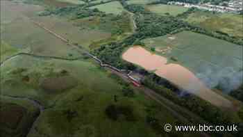 Diesel spill after train derails and catches ablaze declared 'major incident'