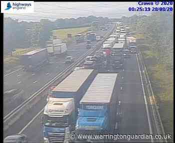 7 mile queues on M6 as lanes closed due to flooding