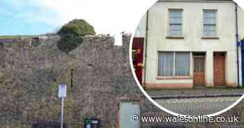 Tenby terrace hiding behind the town wall up for auction