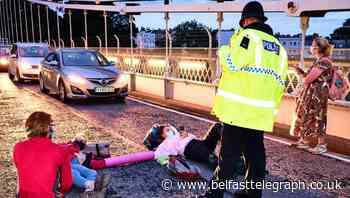 Two arrests after Extinction Rebellion protesters block Bristol bridge - Belfast Telegraph