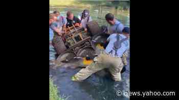 Video shows man trapped by mower under water freed by first responders in Oklahoma