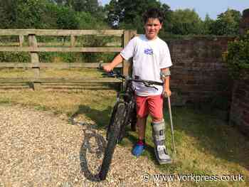 Arthur, 8, in cycling challenge for Covid vaccine