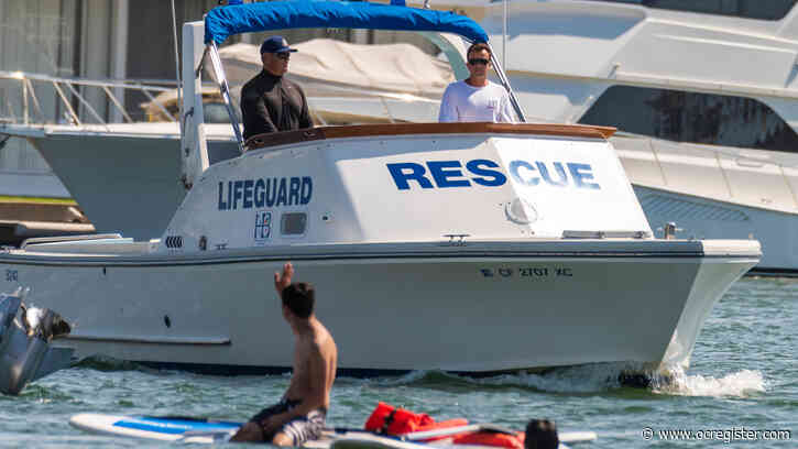 Lifeguards added to Huntington Harbour as crowds and illegal bridge jumping increase