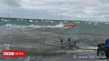 Five rescued from sea in choppy waters off Anglesey after boat capsizes
