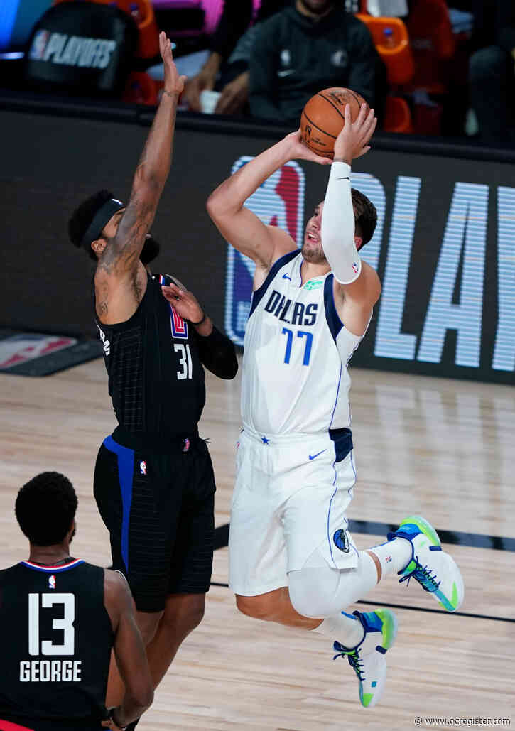 Watch it: Marcus Morris Sr., ejected after hard foul on Luka Doncic; Clippers lead at half, 57-51