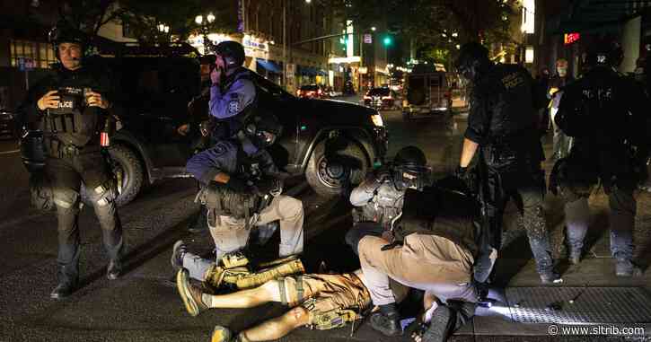 Protester killed in Portland as mayor, Trump trade blame