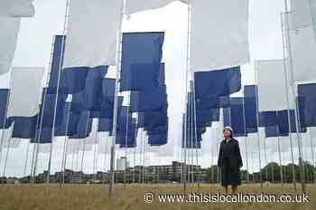 Hospital sheets displayed outside QEH in Covid-19 tribute