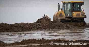 Duluth Harbor dredging, beach restoration work might violate old pact