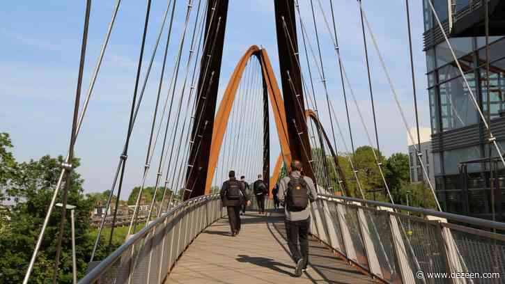 Useful Studio creates arched weathering steel Chiswick Park Footbridge