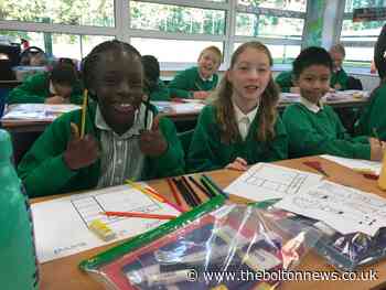 Children all smiles as they are back at Beaumont Primary School on the first day of term