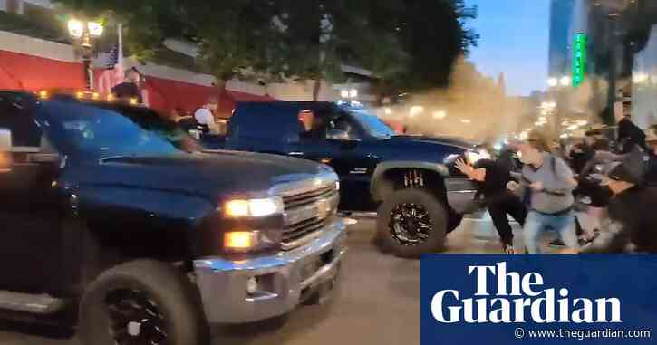 Trump supporters drive through crowd and pepper spray protesters in Portland – video
