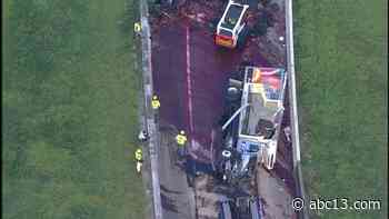 HOUSTON TRAFFIC: Heavy truck carrying loads of juice topples over - KTRK-TV