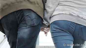 Wear a mask while having sex with someone new, Canada's top doctor suggests