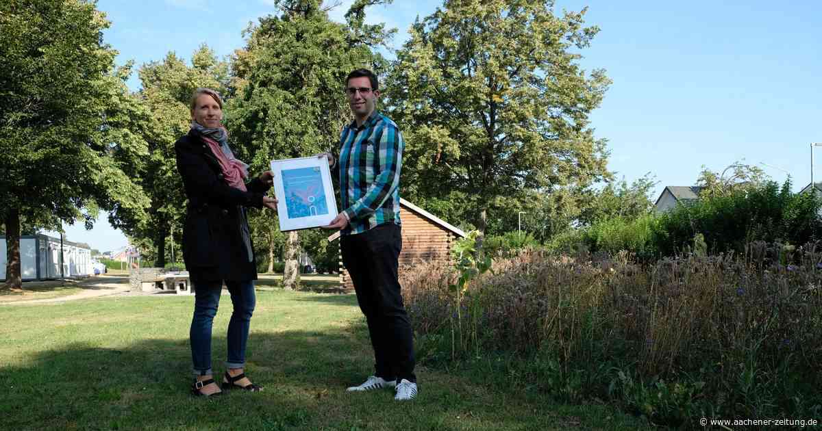 Klimaschutzpreis in Aldenhoven: Dorfgemeinschaft erhält Klimaschutzpreis für Bienen-Infopunkt - Aachener Zeitung