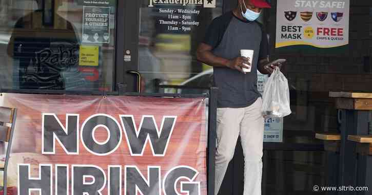 Jobless claims fall to 881,000 but layoffs remain elevated
