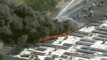Crews battling large industrial fire in Scarborough