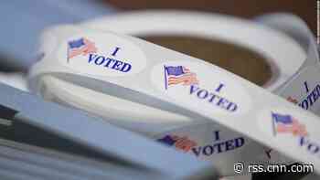 Facebook and Twitter labeled Trump's post about voting twice, but never said doing so was illegal