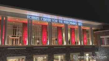 Forbes Center lit up red to highlight the arts industry impacted by COVID-19 - WHSV