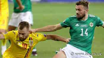 10-man Northern Ireland snatch draw against Romania