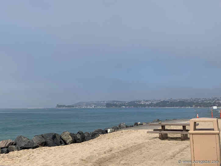 Sand helps bring beach vibes back to Capistrano Beach, an area battered by storms and high tide