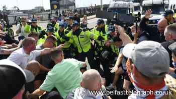 Nine arrested as police clash with anti-migrant protesters in Dover