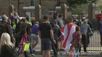 Police clash with anti-migrant protesters at Dover port
