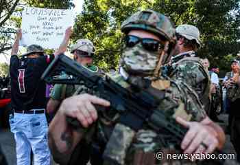Armed demonstrators confront Breonna Taylor protesters in Louisville before Kentucky Derby