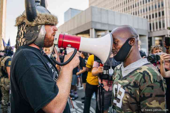 Opposing groups confront each other at Kentucky Derby protest