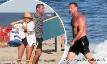 Liev Schreiber, 52, enjoys a beach day with girlfriend Taylor Neisen, 27, in the Hamptons