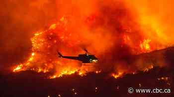Hundreds airlifted to safety in California as wildfires rage