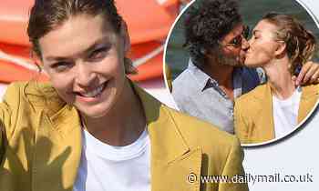 Arizona Muse wows in a mustard suit before packing on the PDA with husband Boniface Verney-Carron