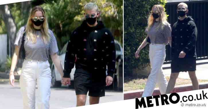 Sophie Turner and Joe Jonas spotted on first outing together since having their baby