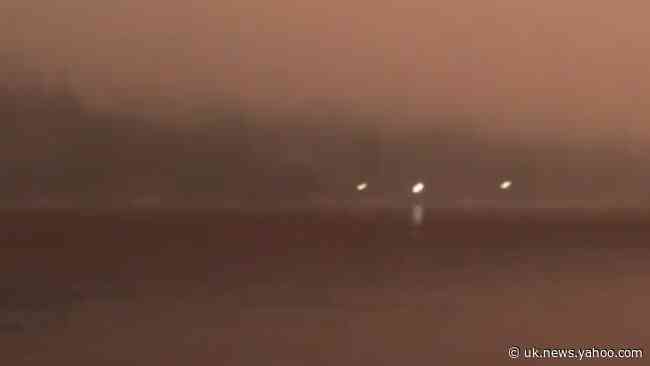 Smoke Covers California's Bass Lake as Creek Fire Spreads