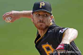 Pirates score twice in 9th, rally past Reds 3-2