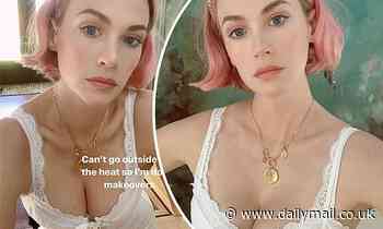 January Jones puts on a busty display in white lace dress