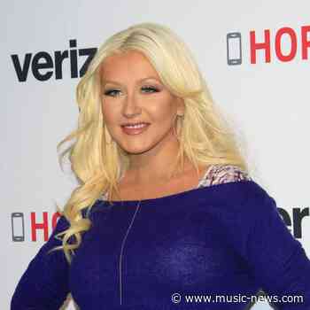 Christina Aguilera feels 'blessed and humbled' listening back to debut single