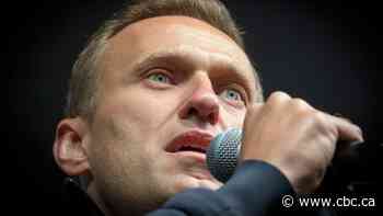 Poisoned Russian opposition leader Alexei Navalny responsive after being taken out of medically induced coma