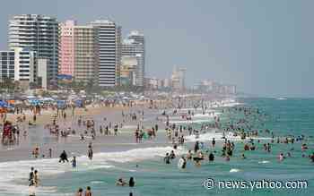 Sweltering crowds throng to beaches for Labor Day weekend, despite pandemic worries