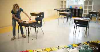 Minnesota students return to class at school and at home