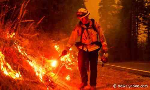 California wildfires burn record 2m acres as new blazes force evacuations