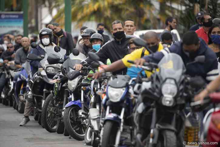 Venezuelan gas lines surge as Iranian tankers go undercover