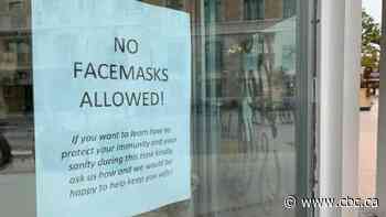 Saskatoon health and beauty store's sign banning masks raises concerns