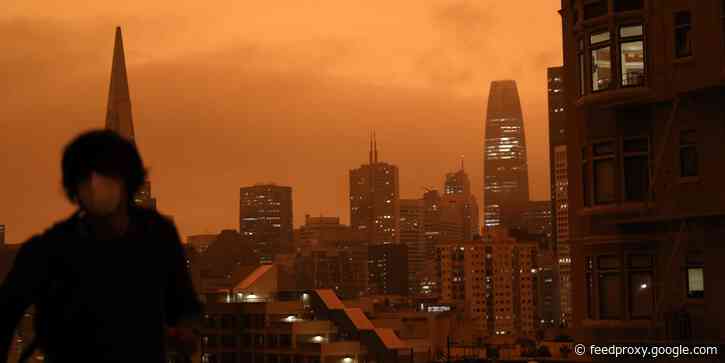 Striking photos show wildfire smoke turning the sky orange over San Francisco