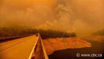 California fire that killed 3 threatens thousands of homes